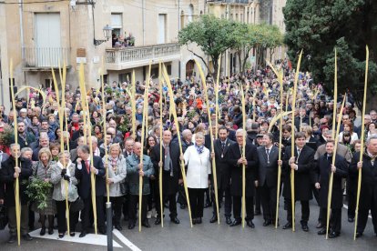 La gent, amb les palmes