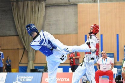 Uno de los combates de taekwondo en Salou.