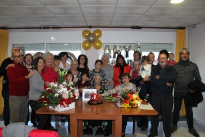 Foto de familia del acto de celebración de los 100 años de Maria Fidalgo.