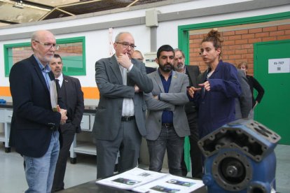 Al centre de la imatge els consellers Josep Bargalló i Chackir el Homrani, avui al Pere Martell.