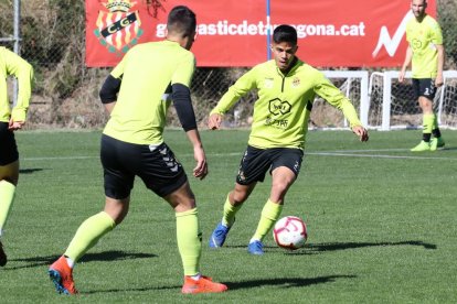 Brugui, que va ser l'últim canvi d'Enrique Martín al Carlos Tartiere, durant una acció en un entrenament.