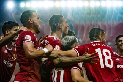 Els jugadors del Nàstic celebrant el gol de la victòria de Nacho González.