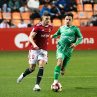 Alexandru Tirlea durant el partit contra el Cornellà.