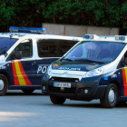 Imatge d'arxiu de dos vehicles de la Policia Nacional.