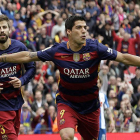 Luis Suárez i Gerard Piqué, celebrant un gol del Barça