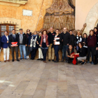 Imatge dels diferents restauradors del municipi durant una visita guiada a la Vila Closa.