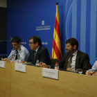 El comisario jefe de los Mossos, Josep Lluís Trapero; el conseller de Interior, Jordi Jané; el director general de la Policía, Albert Batlle, y el jefe de los Mossos en Barcelona, el comisario Joan Carles Molinero, hoy.