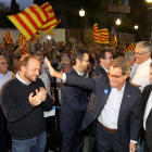 Artur Mas, Jordi Sendra y Joan Miquel Nadal, momentos antes de hacer su intervención ante|delante de unas quinientas personas.