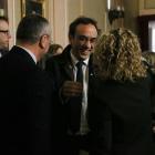 Josep Rull rient amb Meritxell Roigé abans del ple d'investidura a Tortosa