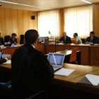 Plano general del juicio a dos acusados en relación al asesinato de una cajera en Cambrils en la Audiencia de Tarragona.