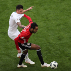 ose Gimenez of Uruguay in action against Mahmoud Kahraba (R) of Egypt