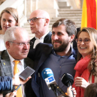 Los consellers cesados por el 155 Lluís Puig, Toni Comín y Meritxell Serret después de conocer la decisión del juez belga.