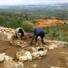 Arqueólogos trabajando al yacimiento