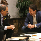 El president de la Generalitat, Quim Torra, i el líder de Podem, Pablo Iglesias, reunits al Palau de la Generalitat.