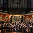 L'Orfeó Català, l'Orfeó Reusenc i la Coral Regina de Manlleu actuant conjuntament al Palau de la Música en el marc del projecte Xarxa Coral.