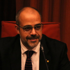 Imagen del conseller de Interior, Miquel Buch, compareciendo a la comisión de Interior del Parlamento