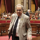 El president de la Generalitat, Quim Torra, sortint de l'hemicicle del Parlament