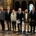 Foto de grupo de los ocho rectores de las universidades públicas catalanas.