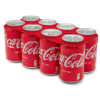 Llaunes de Coca-Cola amb els nous agrupadors de cartró reciclable.