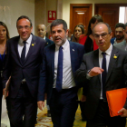 Josep Rull, Jordi Sànchez i Jordi Turull caminant pels passadissos del Congrés el 20 de maig del 2019.