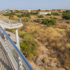 Terrenos que se tienen que urbanizar para construir un nuevo centro comercial y viviendas.