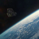 Imatge simulada d'un asteroide prop del planeta Terra.