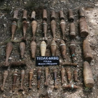 Els 32 artefactes explosius trobats en un marge d'una zona de conreu a Xerta.