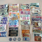 Biletes i monedas de coleccionista requisadas a los ladrones detenidos por 10 asaltos a domicilios.