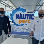 Joaquim Cristià i Jordi Rom mostrant la nova imatge i marca de l'Estació Nàutica.