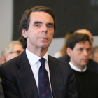 El expresidente del gobierno español José María Aznar sentado a la jornada organizada por FAES en Valencia.