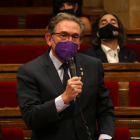 Imagen del consejero|conseller de Economía y Hacienda, Jaume Giró, en el Parlamento.