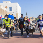 Los perros llenan el paseo de l'Escullera de Tarragona en el IV Canicross Solidario