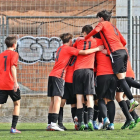 El Infantil A de la Fundación Fútbol Base Reus celebrando un gol.