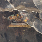 L'anàlisi d'una fresca a Pompeia ha mostrat el que podria ser un plat avantpassat de la pizza actual