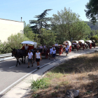 Els portants de l'aigua de Sant Magí arribant al poble de Querol.