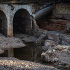 Un dels ponts afectats pels aiguats de l'Ebre al límit dels termes de La Ràpita i Alcanar