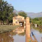 Imatge d'una de les finques de Roquetes inundades.