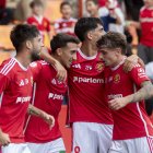 Jaume Jardí, Marcos Baselga, Marc Montalvo i Pau Martínez celebrant plegats el gol de la victòria contra el Marbella.