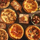 Imagen de la variedad de pizzas que se cocinan en el restaurante Ditaly.