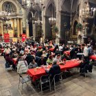 Dinar de Nadal organitzat per la Comunitat de Sant Egidi a la Basílica de Just i Pastor de Barcelona.