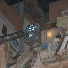 Imatges de la tràgica nit viscuda fa vint anys al número 72 de la Rambla Nova arran de l'explosió de gas.