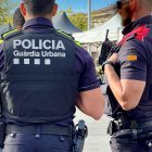 Imatge d'arxiu de dos agents de la GUT i els Mossos en una acció conjunta.