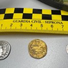 Les tres monedes tindrien una antiguitat de més de 1.000 anys.