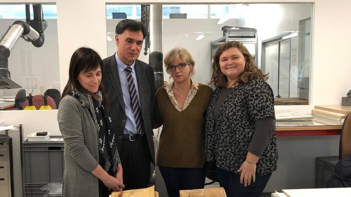 Restauran dos 'Llibres del Comú' de fondo del Archivo Municipal de Reus