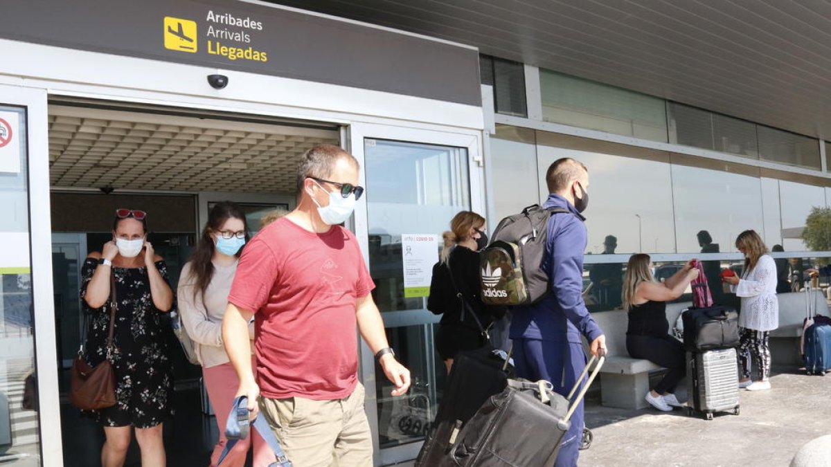 El aeropuerto de Reus, pasajeros, mascarilla, coronavirus, covid-19