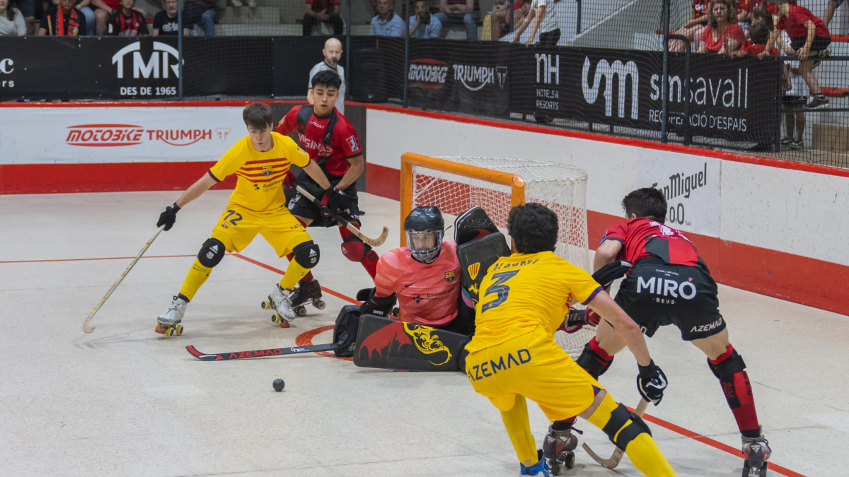 Una jugada del anterior partido entre Reus Deportiu i Barça en el Palau d'Esports.