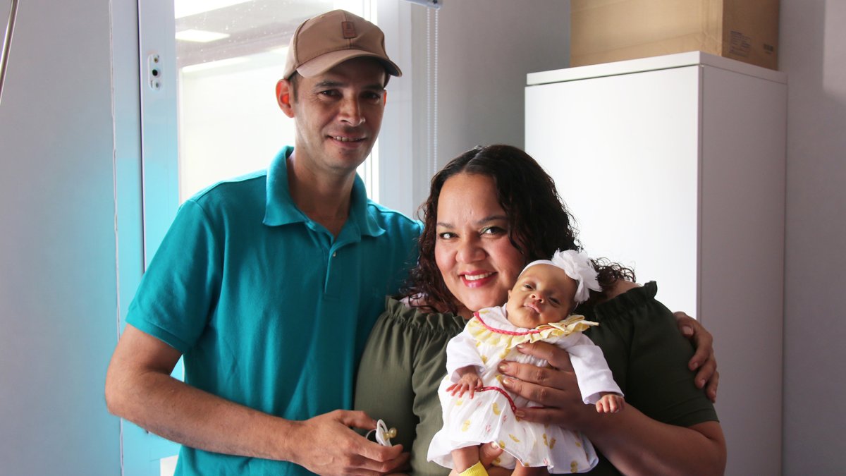 Melany y sus padres.