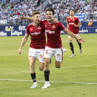 Pol Domingo i David Concha celebrant el gol del Nàstic a la Rosaleda.