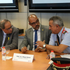 Quim Torra, del conseller d'Interior, Miquel Buch, i del comissari general d'Informació dels Mossos d'Esquadra, a la reunió del Gabinet de Coordinació Antiterterrorista,