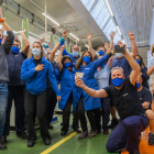 Trabajadores celebrando el primer premio.